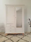 armoire vintage beige pieds compas miroir tiroir étagères penderie